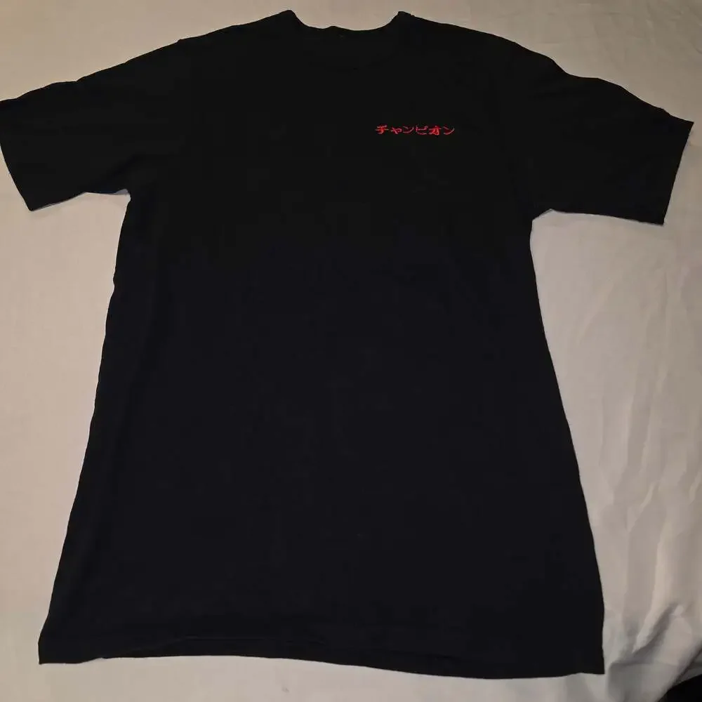 Champion Japanese Logo Graphic Short Sleeve T-Shirt in Black